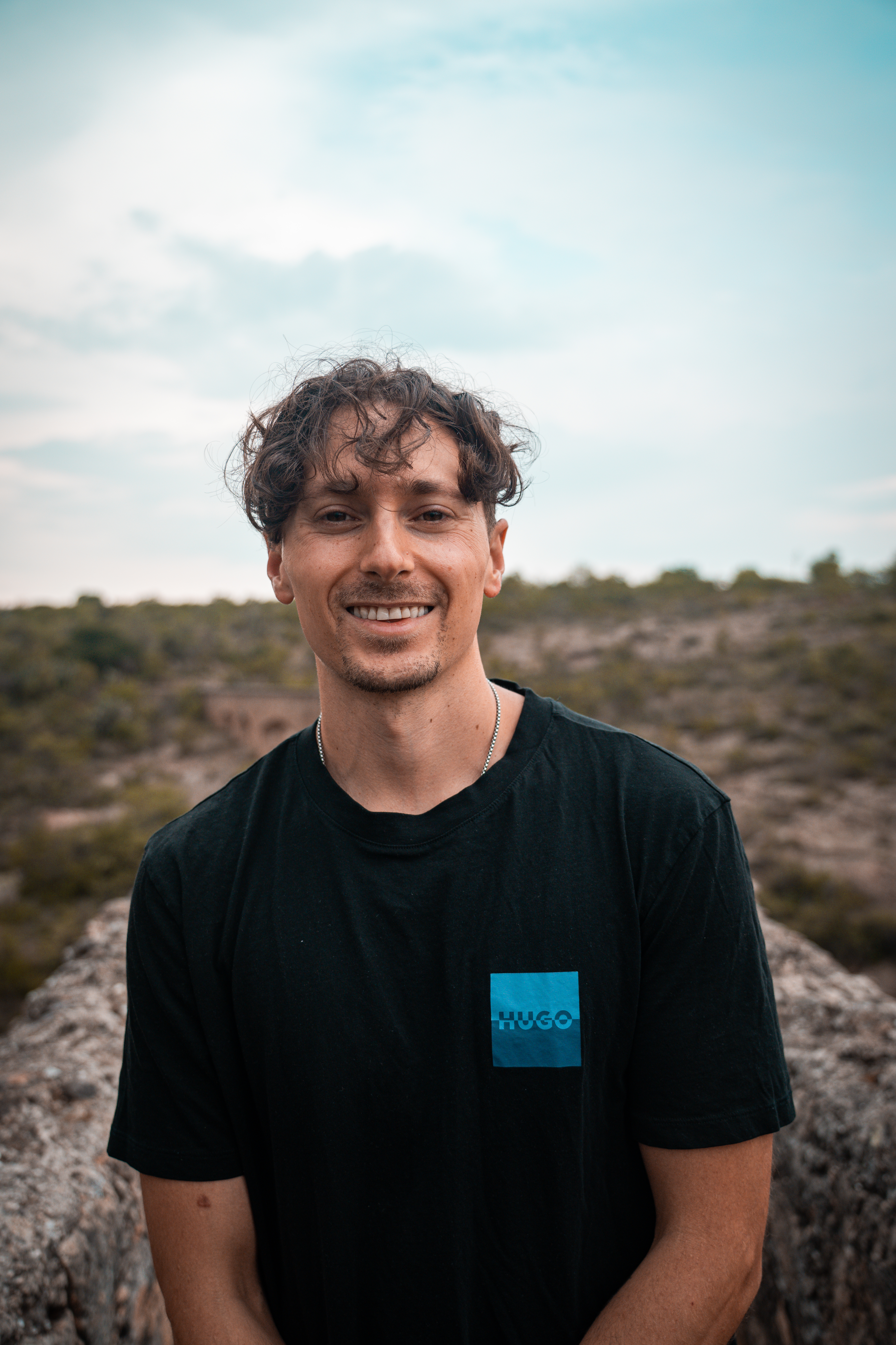 Zach Cohen outdoors in a black shirt
